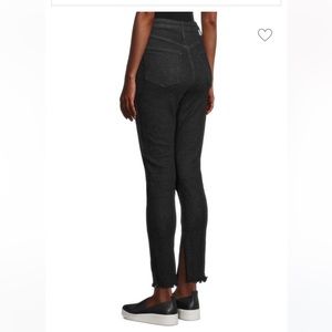 We Wore What black jeans with chain size 4